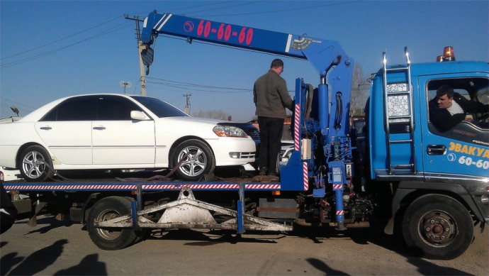 Выезд с эвакуаторами на автомобильную барахолку в предместье Рабочее