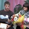 Счастливые родители с "юбилейными" малышами