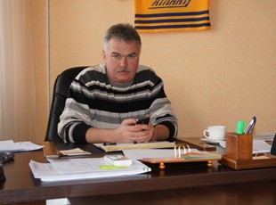 Александр Белан
