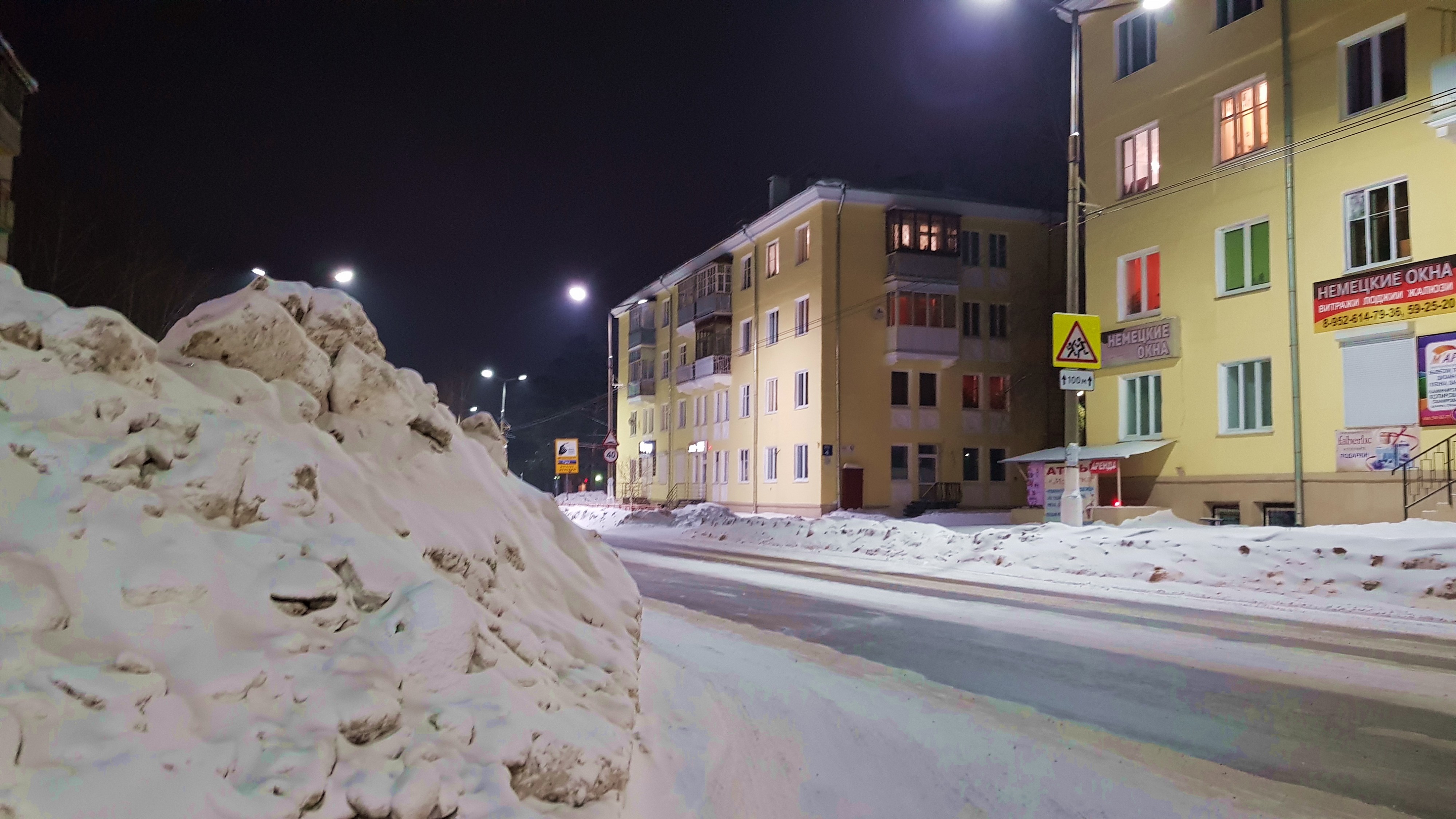 улица Энгельса вечер январь куча снега