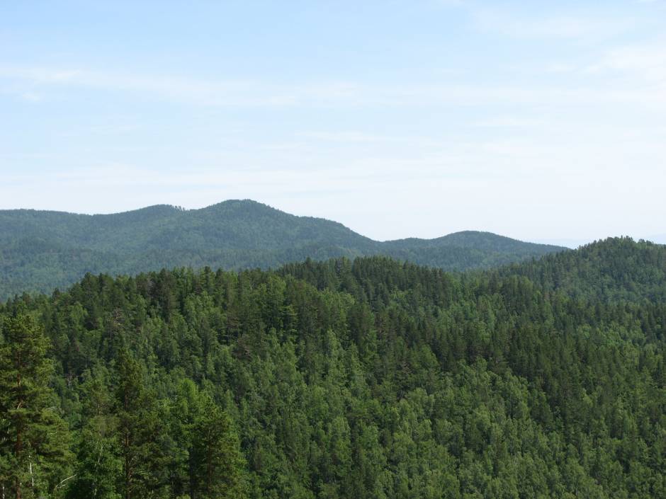 С пика Черского