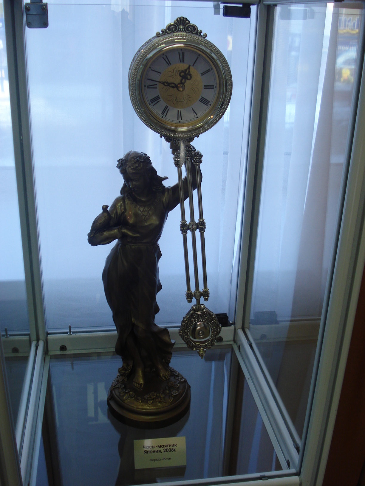 Скульптура часы