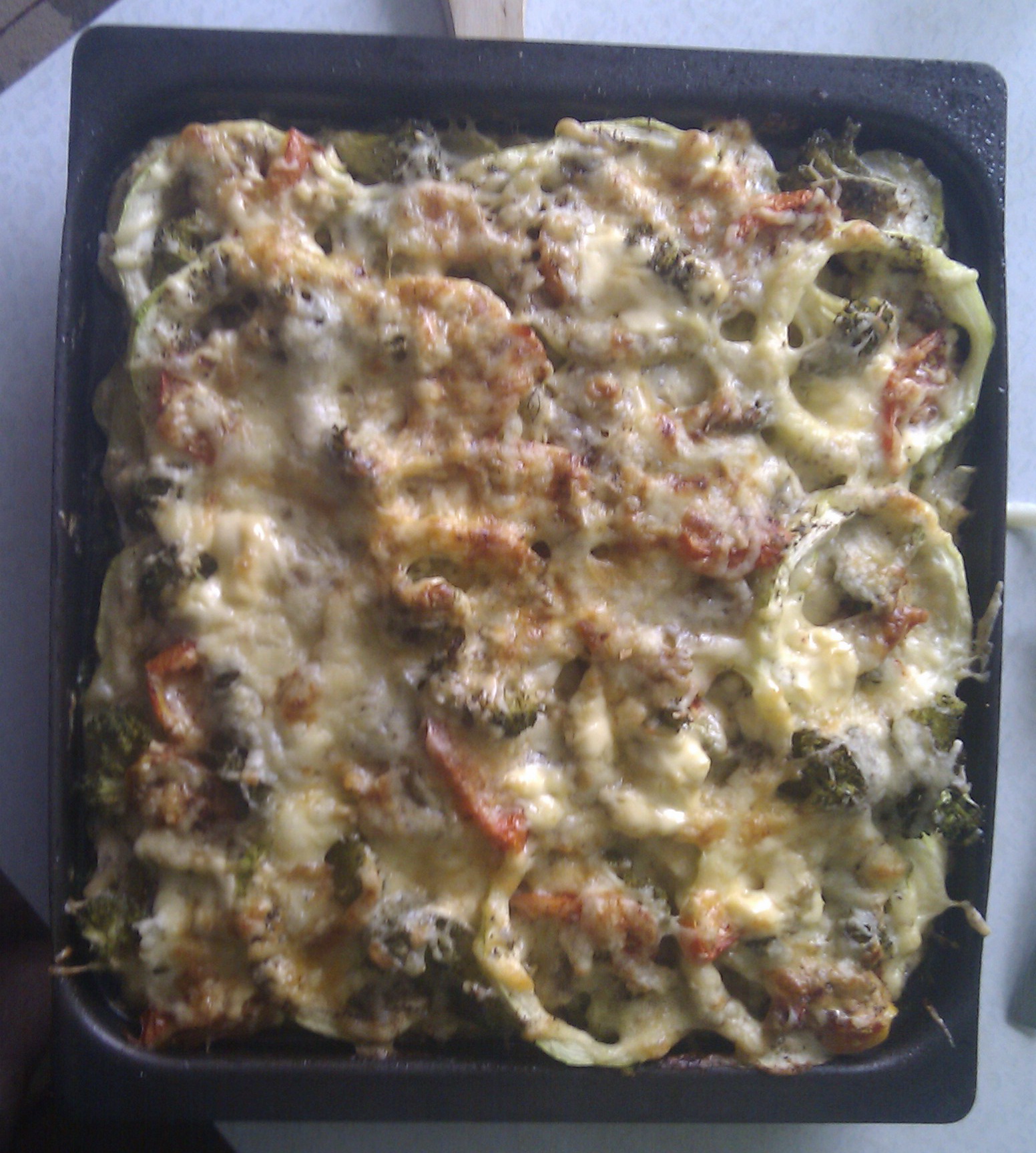 Кабачки под сыром со свининой)))))