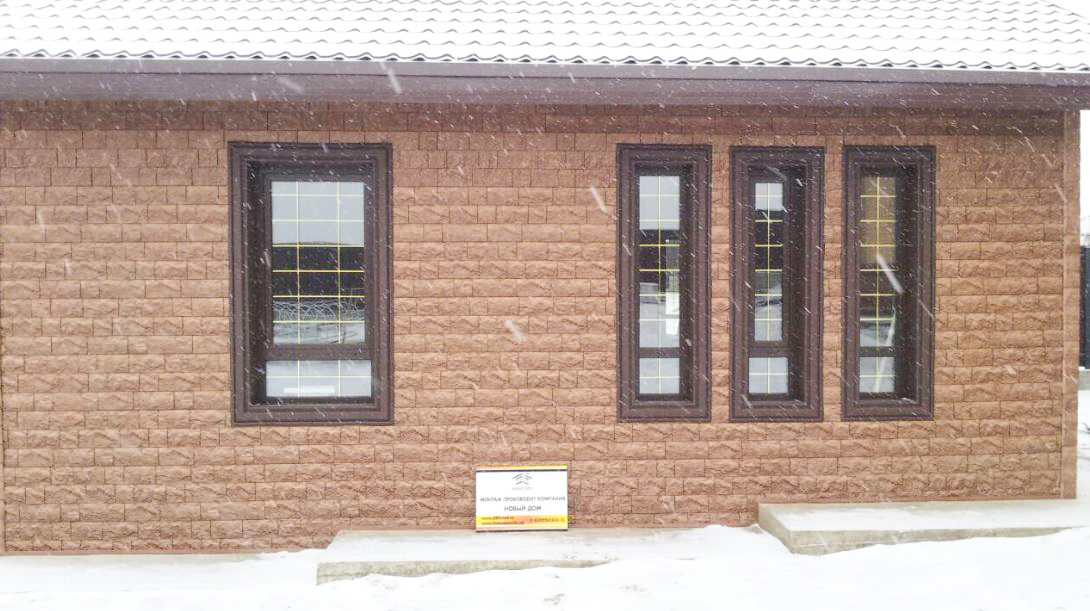 Отделка дома фасадными панелями