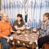 Инициативная группа собралась вместе, чтобы отметить первую победу чашкой чая