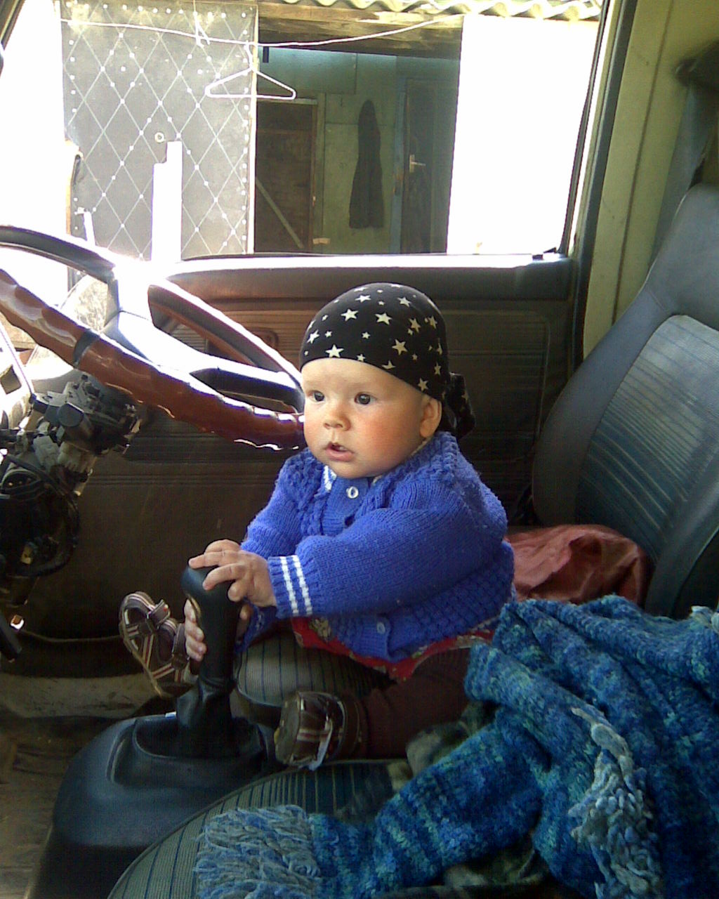 Сына юный водила